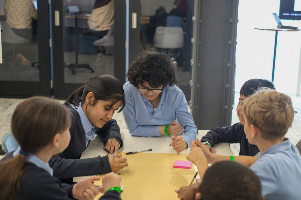 An image of children engaging in a classroom activity
